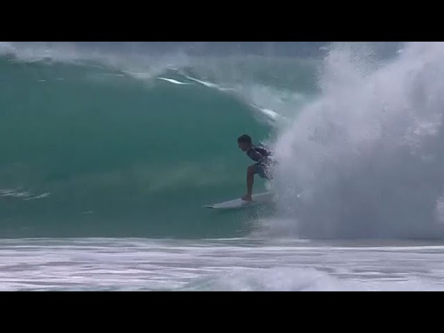 That's perfect! US rookie surfer's rare triple barrel