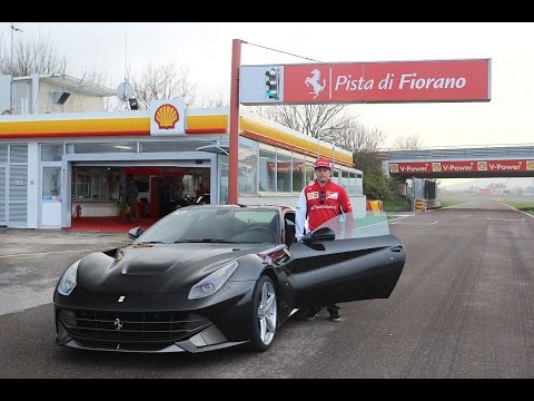 Kimi Räikkönen - 740 hp. Ferrari F12berlinetta and journalist Fear perched on