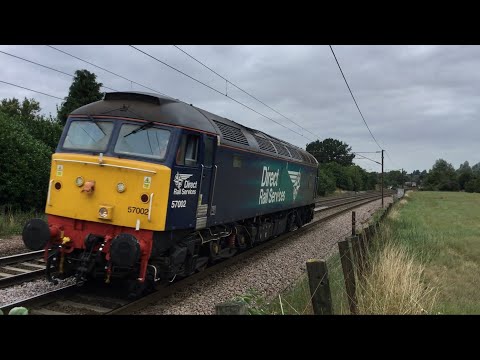 DRS 57002 heads north at Spikes Lane working 0Z61