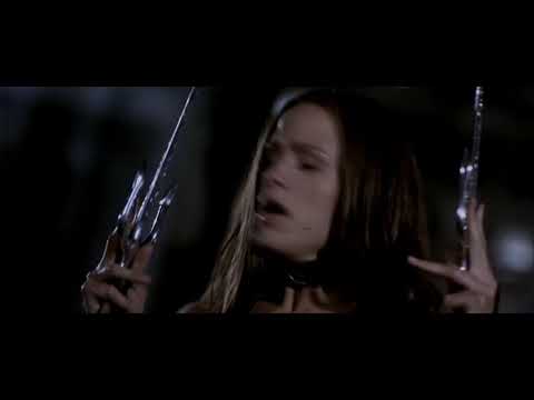 Moody trailer frame of rain-drenched Hell’s Kitchen with score textures rumbling