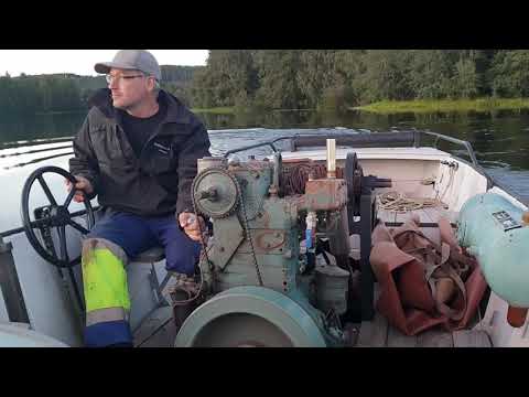 Unique one cylinder diesel boat engine starting up