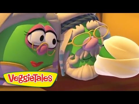 Two VeggieTales characters—green vegetables with glasses sharing a moment, logo visible in the corner.