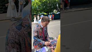 Cliff Richard in a Colourful Jacket Signing Autographs at Wimbledon