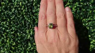 A Peridot and Diamond gem ring