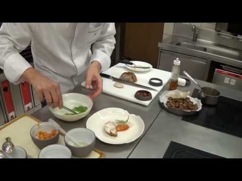 Reitbauer prepares a brain dish at the Michelin star Steirereck in Vienna