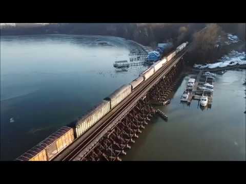 Freight Train & Auto-Train Pass On Bridge @ Sunset