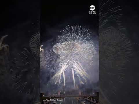 Amazing display of fireworks light up the Eiffel Tower ahead of Bastille Day