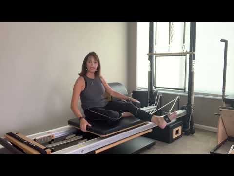 Quick Pilates Reformer workout using one spring and one strap
