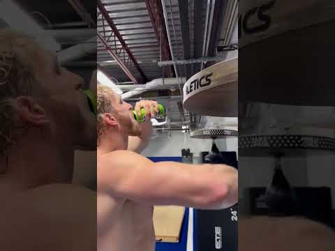 Logan Paul's Prime drink falls and he catches it without even looking while speed boxing a bag