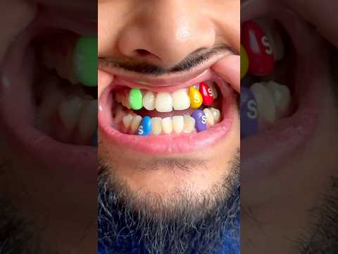 Turned Skittles candy into wearable grills! Who’s wearing these😎 #skittles #candy #grills #art