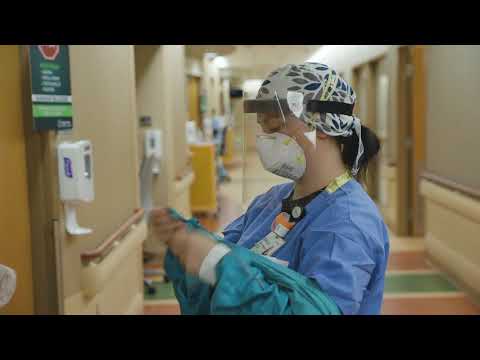 Exhausted in a 'nightmare': A look inside a Michigan hospital COVID unit