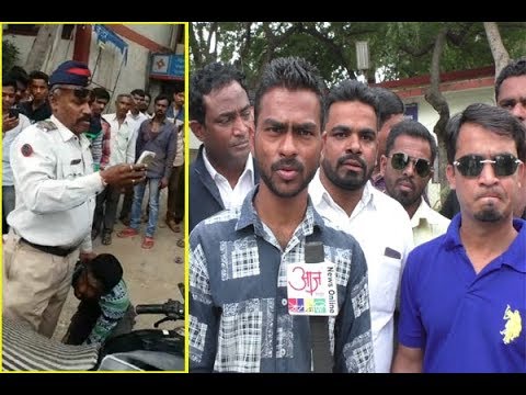 ट्राफीक पोलिसाची दादागिरी, पाया पडायला लावले