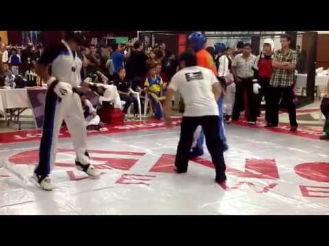 Byron Young Vs UNK II - 16 and 17 Black Belt man sparring Elimination.  Antigua, Guatemala