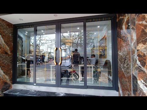 Cửa trượt quay 4 cánh – cửa nhôm kính trượt quay