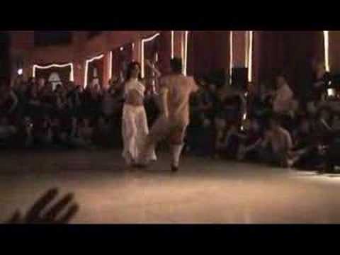  Natacha Poberaj  and  Eduardo Villegas  are  dancing  to  a  chacarera