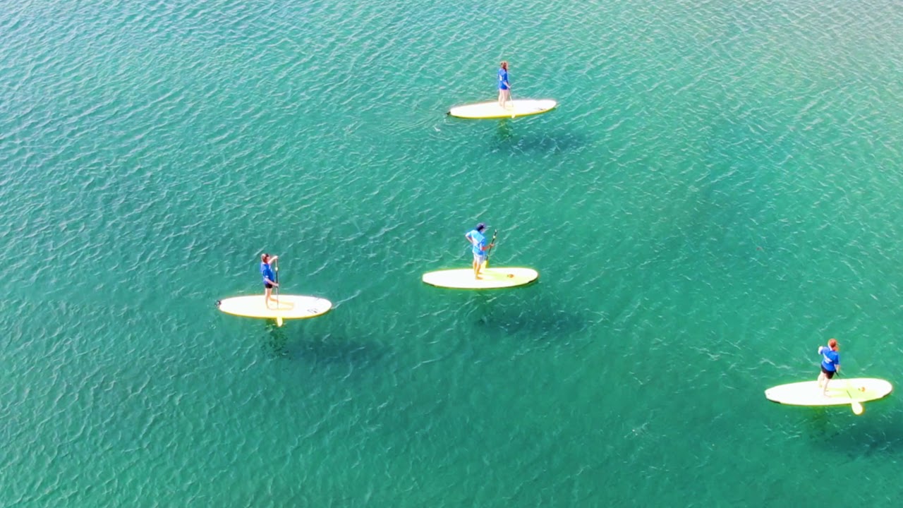 Glide through Byron Bay with Stand Up Paddleboarding adventure.