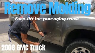 Removing old side molding GMC truck: taking 10 years off the age of your truck!