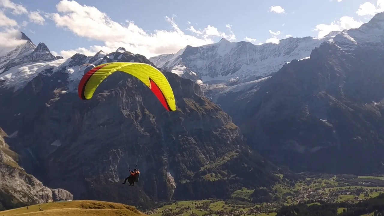 Embark on an exhilarating tandem paragliding journey from Grindelwald First.