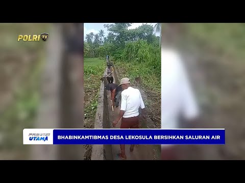 BHABINKAMTIBMAS DESA LEKOSULA BERSAMA WARGA BERSIHKAN SALURAN AIR TERSUMBAT