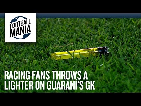 Racing Fans Throws a Lighter on Guaraní's GK