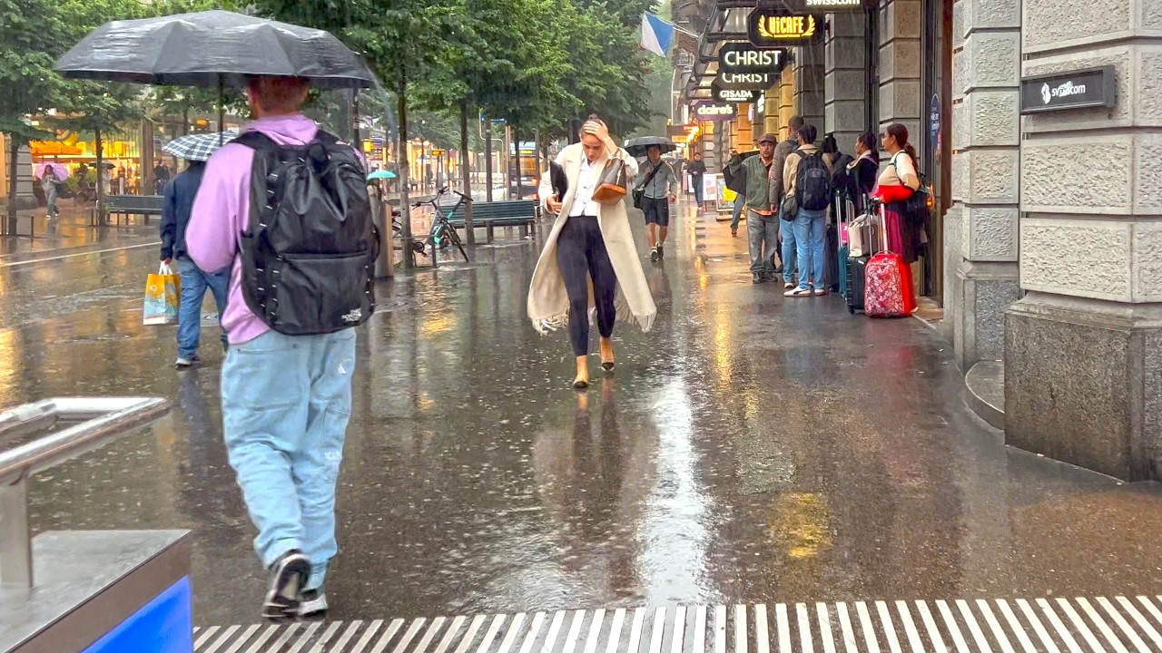 Immersive street-level walking tour through Zurich Bahnhofstrasse, Switzerland, showcasing authentic urban landscapes, local architecture, and the vibrant atmosphere of the city's neighborhoods