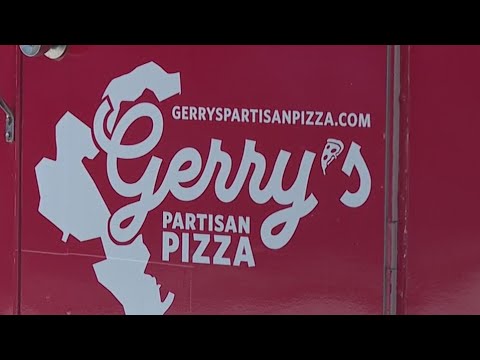 People bringing awareness to Gerrymandering with pizza