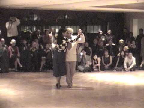  Riccardo Maceiras  and  Elina Roldan  are  dancing  to  a  tango