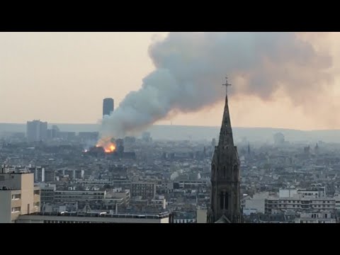 Firefighters are battling a huge blaze atop the French capital's iconic Notre Dame Cathedral. (April 15)