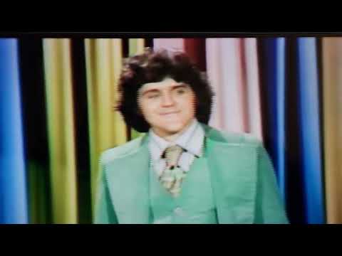 An unknown Jay Leno  doing stand up on the Johnny Carson show
