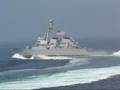 Navy ship taking "evasive action"