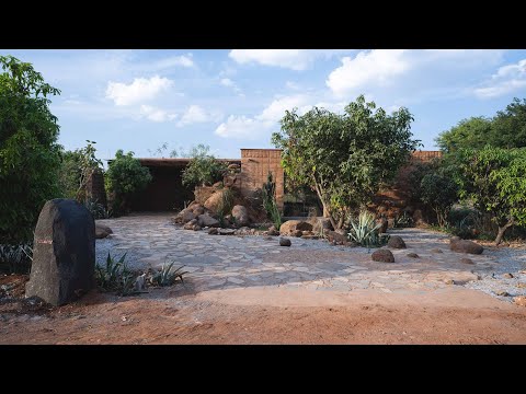 A sleek, modern farmhouse with a sustainable flair