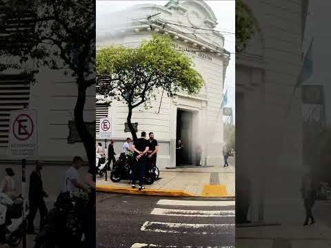 Rain Protecting the View of a Bank Entrance 💧🏦