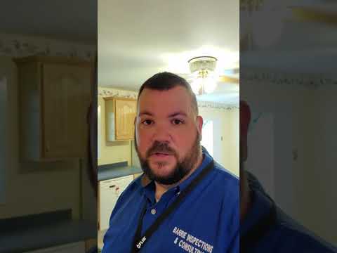 Home inspector finds ceiling fan connected to GFCI outlet in kitchen