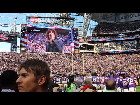Cobi Sings National Anthem at Packers vs. Vikings Game