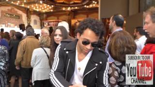 Corbin Bleu and Sasha Clements greet fans outside Pantages Theatre in Hollywood