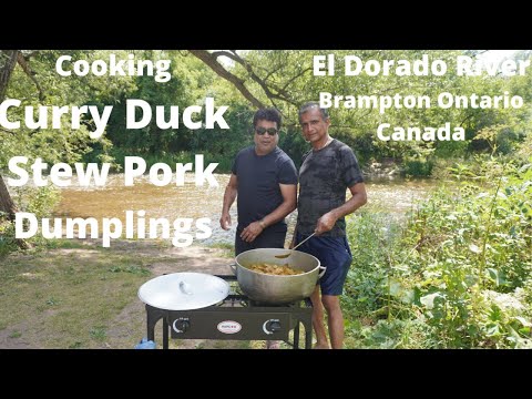 Trinidad-style curry duck and stew pork | Fun time cooking by the river with my cousins in Canada.