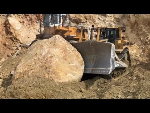 Caterpillar D8T Bulldozer Pushing Huge Rocks - Labrianidis Mining