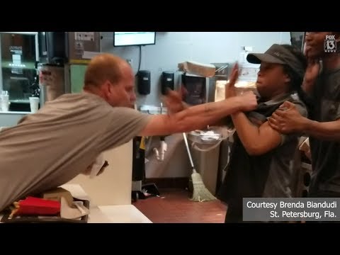 RAW: Man grabs fast-food clerk in fight over straw