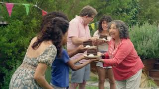 Hefty Grandmother cutting the cake