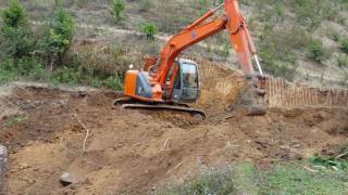 Zaxis 135 san lấp đồi