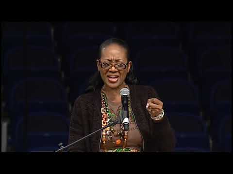 Dr. Judith McAllister prays for Vandalyn Kennedy