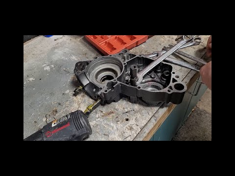 1984 kawasaki kdx 200 working on motor cases.