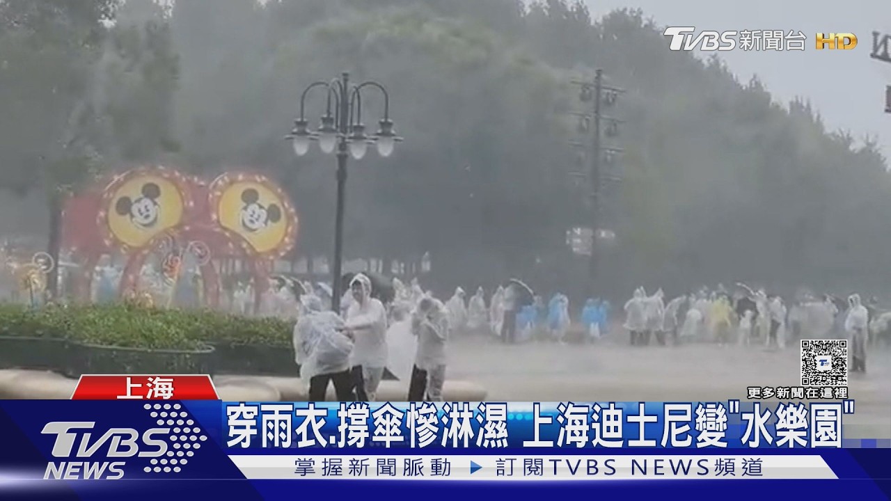 影音/颱風白海豚襲陸!杭州西湖遊客「蹲地死撐傘」躲暴雨