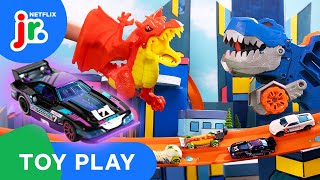 Ultimate T-Rex Transporter VS Fire Breathing Dragon! 🔥 Hot Wheels Let's Race | Netflix Jr