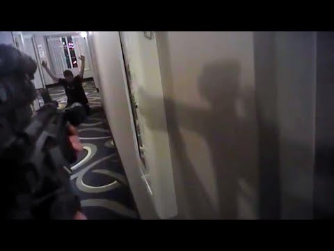 , title : 'Footage Shows Man Begging For His Life Before Officer Shoots Him Dead in Hotel'