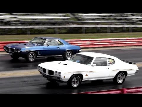 GTO Judge Ram Air III vs Ram Air 400 HO Firebird - 1/4 Mile Drag Race and Burnout - Road Test TV ®