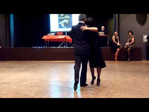  Jose Luis Gonzalez  and  Paulina Cazabon Goméz  are  dancing  to  the  tango  "  El Adios  "  by  Osvaldo Pugliese