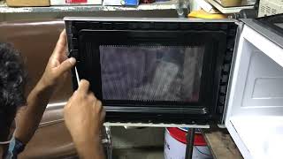 How to remove cokroaches from microwave oven door