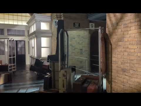 Disappearing into the wall Kings Cross Station, platform 9 3/4