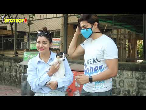 Gurmeet Choudhary and wife Debina Bonnerjee with their pet dog spotted at Kitchen Garden